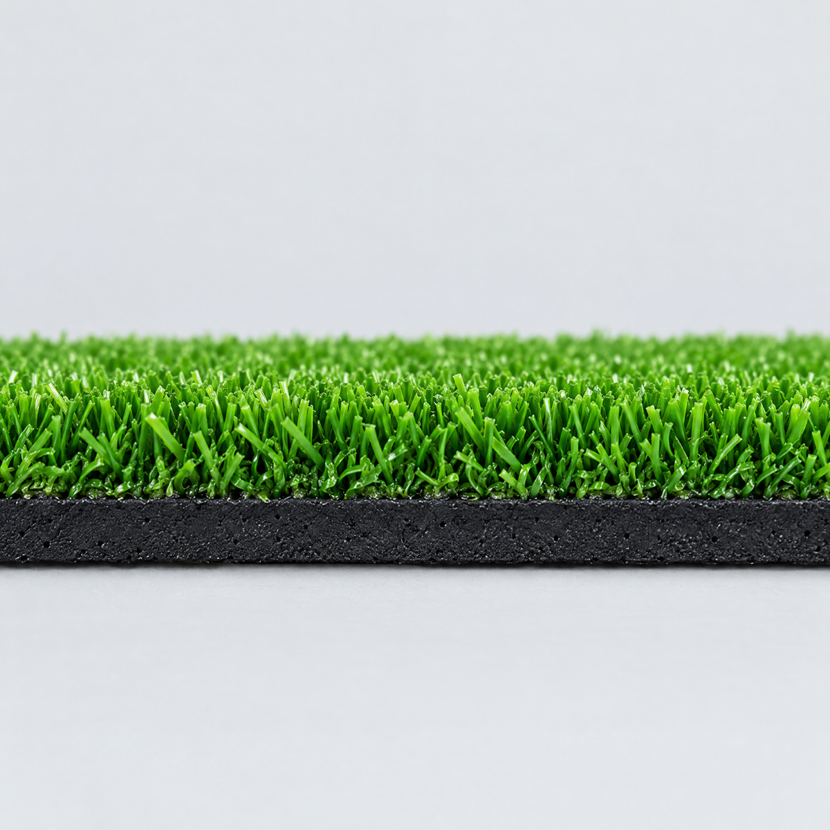 Close-up of short dense turf on a 10 mm rubber base (illustrative image)